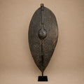 Close-up of carved wood detail on a Dinka Shield from South Sudan at Togu'na