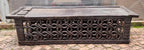 Close-up of natural wood grain on a Bamileke Bed Table - Dark from Cameroon